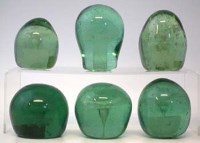 Lot 159 - Six floral glass dumps.