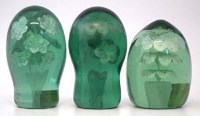Lot 166 - Three glass floral dumps.