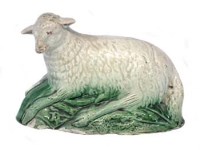 Lot 178 - Staffordshire Wood family figure of a recumbent