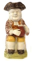 Lot 205 - Early Staffordshire toby jug.