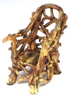 Lot 243 - Pottery rustic model of a chair   decorated with