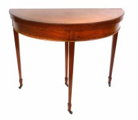 Lot 550 - Edwardian satinwood veneered fold over card table