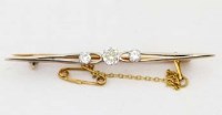 Lot 312 - Three-stone bar brooch