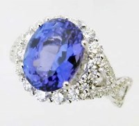 Lot 317 - 18ct white gold tanzanite and diamond ring, the