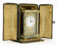Lot 593 - Champlave carriage clock with case.