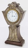 Lot 594 - Silver mounted mantel clock.