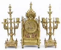 Lot 596 - Brass Gothic Revival architectural three piece clock set