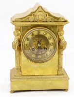 Lot 603 - French brass cased clock.