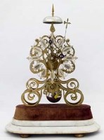 Lot 608 - Brass skeleton clock with a silvered tracery Roman chaptering and Gothic Revival scrolled plates