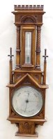 Lot 659 - Victorian oak neo gothic architectural aneroid barometer