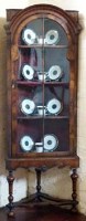 Lot 698 - Early 18th century style walnut floor standing corner display cabinet