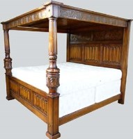 Lot 724 - 7' four poster bed (The Royal Oak Company).