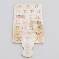 Lot 2 - Ivory alphabet board page marker.