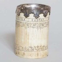 Lot 9 - Ivory tusk beaker with white metal rim and