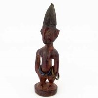 Lot 97 - Ibeji male figure, pointed indigo head dress and