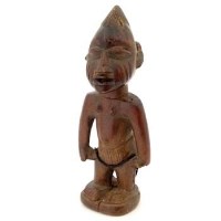 Lot 115 - Egba ibeji male figure wearing an apron, black