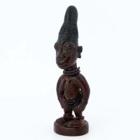 Lot 126 - Yoruba ibeji female figure, indigo head dress