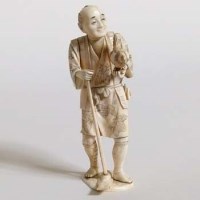 Lot 282 - Japanese sectional okimono of a farmer with a hen