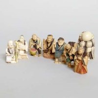 Lot 283 - Seven ivory netsukes and a resin figure (8)
