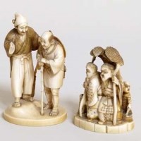 Lot 285 - Ivory okimono of peasants, gilt seal; marine