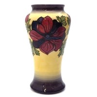 Lot 381 - Moorcroft Anemone on yellow pattern vase boxed.