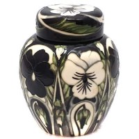 Lot 382 - Moorcroft Harlequinade pattern ginger jar, boxed