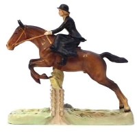 Lot 403 - Beswick lady huntsman.