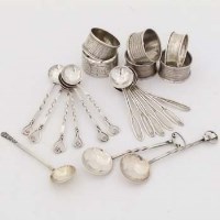 Lot 503 - Six silver napkins rings, two sets of six silver teaspoons and three other spoons.