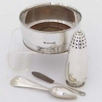 Lot 504 - LGD silver coaster 1953 and a similar silver sugar caster, also five grapefruit spoons and a butter knife.