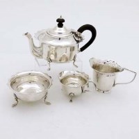 Lot 525 - Three piece silver tea set.
