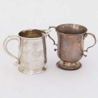 Lot 535 - Silver twin-handled cup and a white metal jug (2)