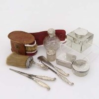 Lot 547 - Five silver and glass items; three brushes