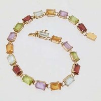 Lot 555 - Link bracelet set with semi precious stones.