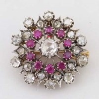 Lot 573 - French ruby and diamond floral cluster pendant /