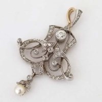 Lot 579 - Diamond and pearl pendant