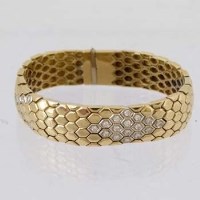 Lot 582 - 18ct (750) gold and diamond bracelet.