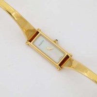 Lot 629 - Gucci gold plated stainless bracelet watch.