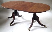 Lot 984 - Early 20th century Georgian style twin pedestal mahogany dining table