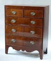 Lot 1034 - George III figured mahogany chest of two short and three long drawers
