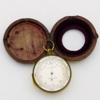 Lot 8 - Cased pocket compass / barometer.