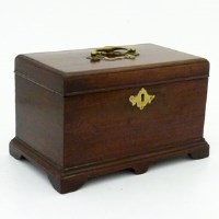 Lot 37 - George III mahogany tea caddy.