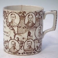 Lot 122 - Football mug.