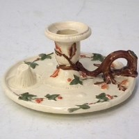 Lot 131 - George Jones chamberstick.