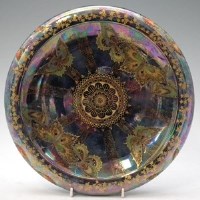 Lot 143 - Fairyland lustre style dish.