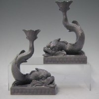 Lot 147 - Pair of black basalt wedgwood dolphins