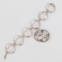 Lot 179 - Georg Jensen brooch and a bracelet.