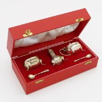 Lot 202 - Cased five piece silver cruet set.