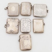 Lot 211 - Seven silver vesta cases.