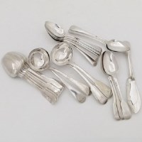 Lot 215 - Mixed silver dessert spoons, two pairs of ladles, two fish knives 32oz in total.
