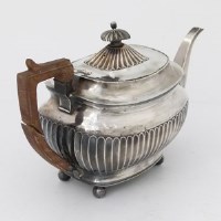 Lot 252 - George IV silver teapot.
